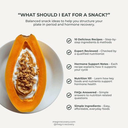 Snack idea with yogurt and granola in a halved papaya on a white plate, with text about balanced snack ideas for period and hormone recovery.